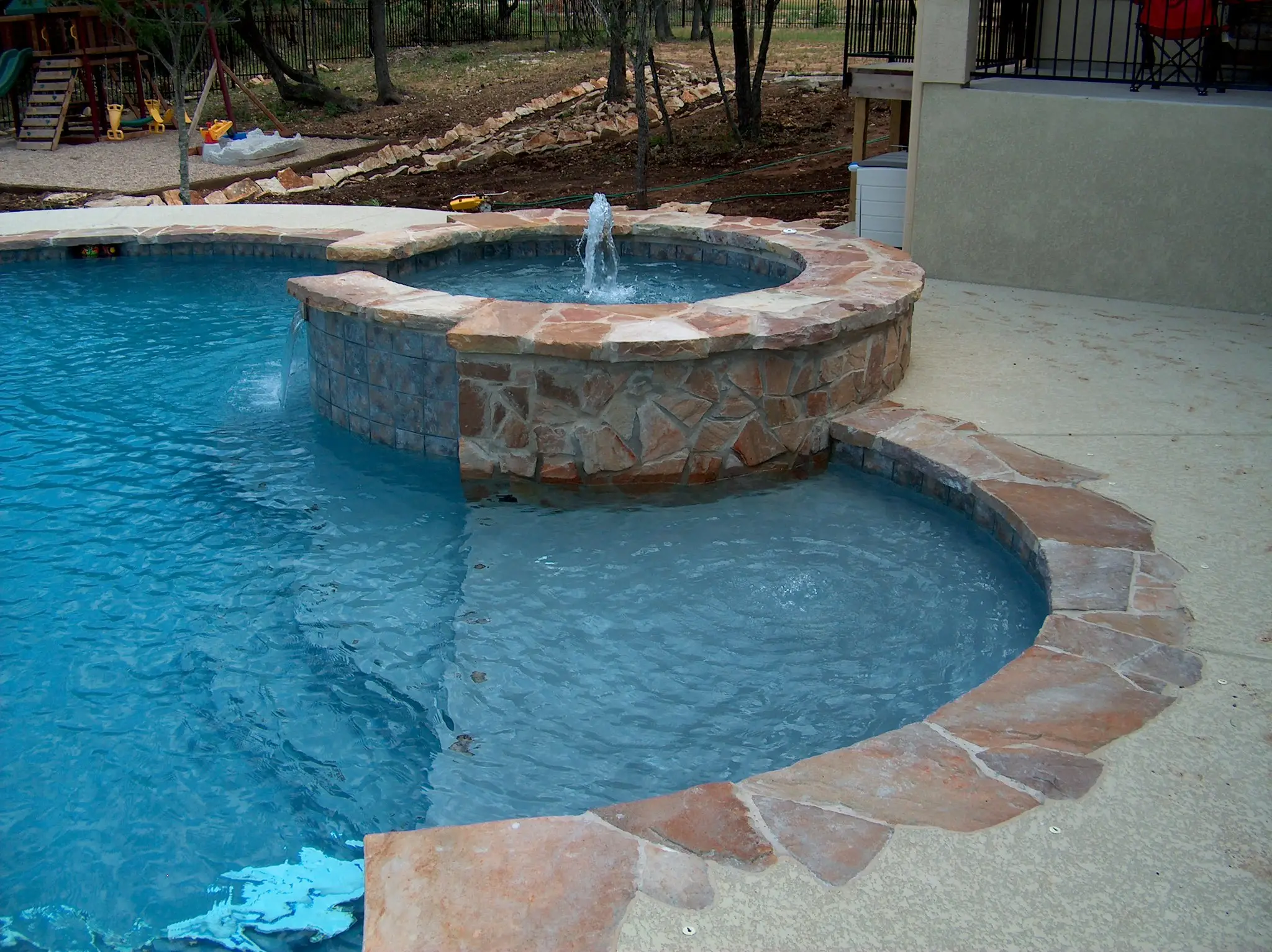 A beautiful outdoor spa area at dusk. A beautiful outdoor spa area at dusk.