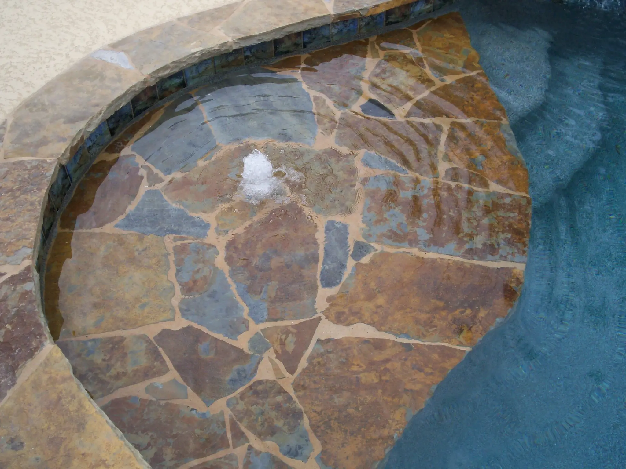 Wide-angle view of a luxury pool installation. Wide-angle view of a luxury pool installation.